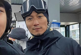 谢霆锋墨尔本滑雪画面：蹲在雪地上教儿子Lucas，合影时摘掉面罩