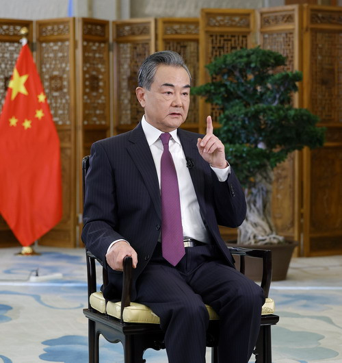 王毅国务委员兼外长就2021年国际形势和外交工作接受新华社和中央广播电视总台联合采访— 中华人民共和国外交部