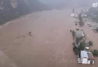 河北洪灾转移122.9万人 涞水县多村被淹失联