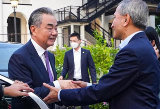 新加坡外长会晤王毅 两国加快全面恢复直航