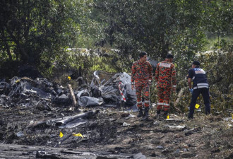马来西亚飞机坠毁寻获遗体 已找到部分黑盒子