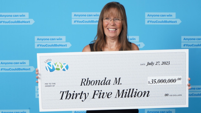 This photo provided by the BC Lottery Corporation shows the winner of a $35-million jackpot who purchased her ticket in Kamloops. 