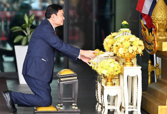 74岁泰国前总理他信回国 被判处8年监禁