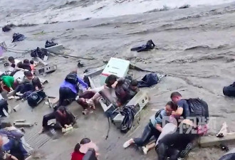 钱塘江大潮拍断 25 米石头护栏，多名游客被冲倒受伤