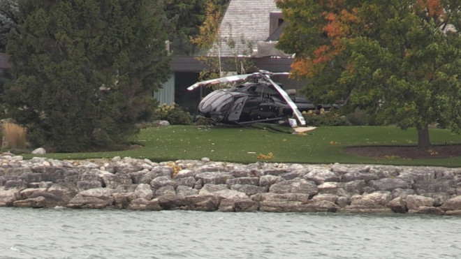 A helicopter is seen crashed onto a waterfront property in Collingwood, Ont., on Mon., Oct. 16, 2023. (CTV News/Alessandra Carneiro)