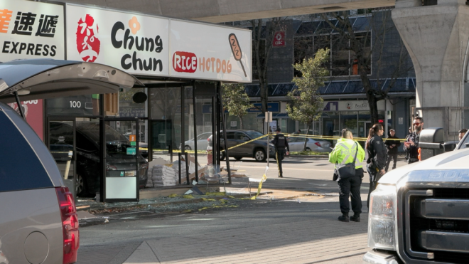 Emergency crews respond after a Tesla crashed into a chain restaurant in Richmond, B.C., on Oct. 27, 2023. 