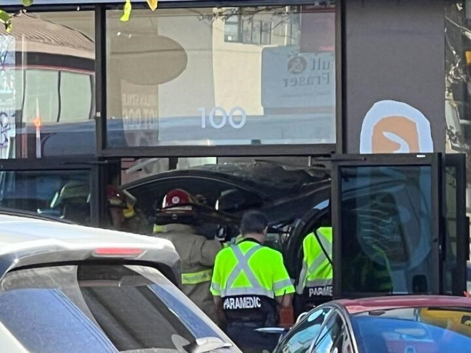 Emergency crews are attending to a vehicle crash at Richmond's Chung Chun Rice Hotdog.