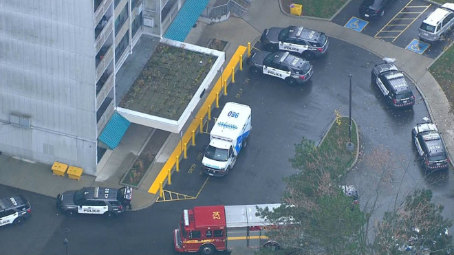 Emergency vehicles are shown outside a Scarborough apartment building during a shooting investigation on Monday afternoon. 