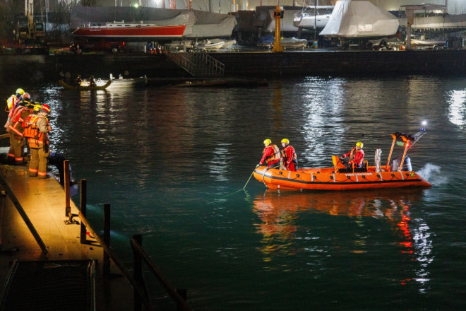 Toronto Firefighters begin shoring operations in attempts to locate one person unaccounted for after a vehicle crashed into Lake Ontario. Jacob Estrin/CP24