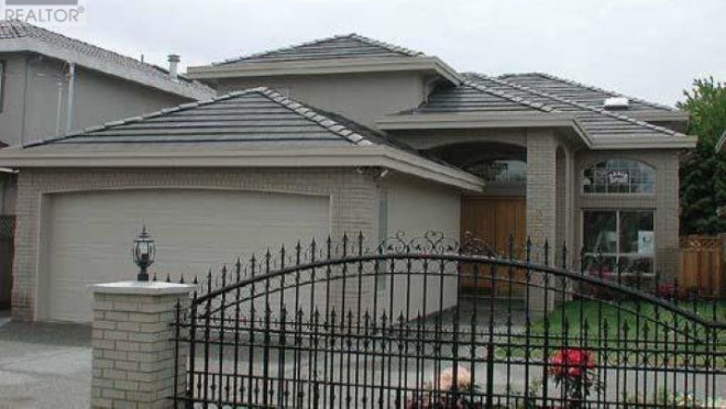 A recent B.C. Supreme Court decision is shedding some light on a bizarre real estate listing offering "undivided half interest" in a five-bedroom home in Richmond for $750,000. The home in question is seen in this photo from the listing. (Realtor.ca)