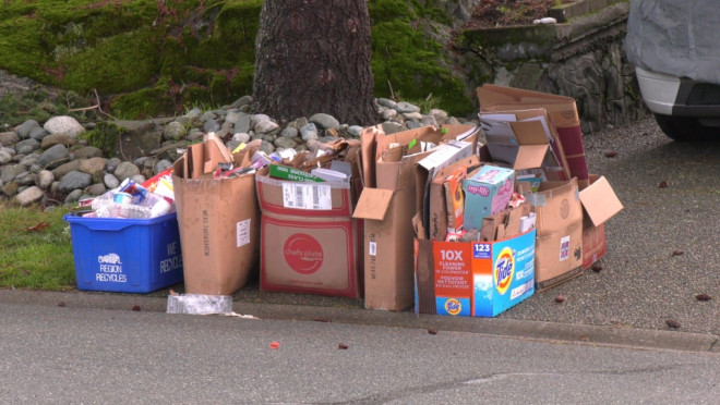 Recycling ready for pickup in front of a residence in Greater Victoria. (File Photo)