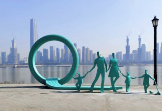 武汉汉口江滩雕塑“一孩变三孩” 专家：为了宣传三孩政策