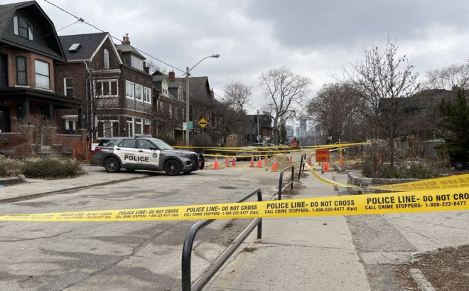 Toronto police officers blocked off part of Withrow Avenue.