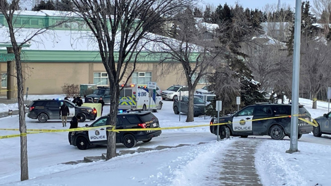 Calgary police are seen outside John Costello School in Strathcona Park on Jan. 16, 2024.