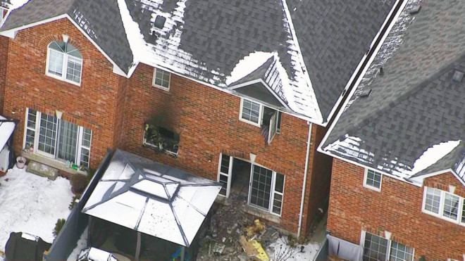 A home in Ajax is damaged after an early morning fire on Jan. 19, 2024. (Chopper 24)