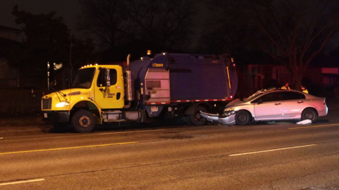 Emergency crews responded to a collision that happened last night in Scarborough involving a garbage truck where two people were transported to hospital. (Jacob Estrin). 