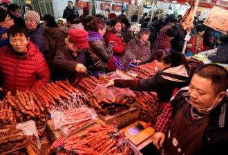 春节前猪肉各地涨跌不一，民众叹购买力不如去年