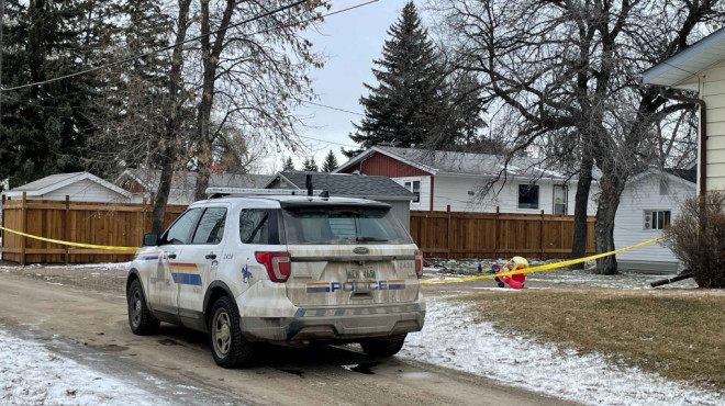 Manitoba RCMP are shown on scene at a home in Carman, Man. on Feb. 12, 2024 following the suspicious deaths of five people in the area a day earlier. (Source: Joseph Bernacki/CTV News Winnipeg)