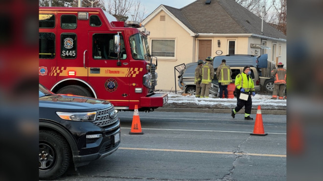 Four people, including two pedestrians, have been taken to the hospital after a driver crashed into a house in north Etobicoke late Sunday afternoon. (Simon Sheehan/CP24)