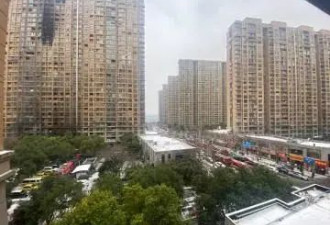 南京火灾同幢幸存者:重新住进去提心吊胆