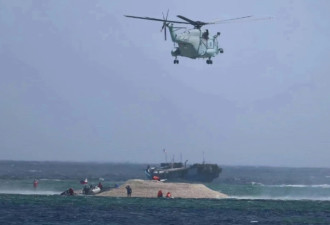 菲律宾再登铁线礁 中国用直升机掀“飞沙走石”驱离