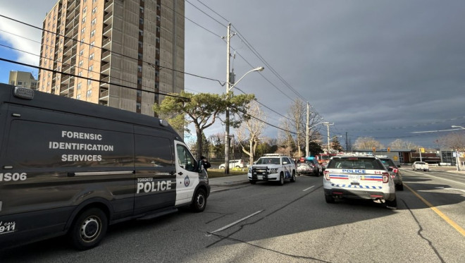 Police vehicles at the scene of a stabbing at Weston and Sheppard.