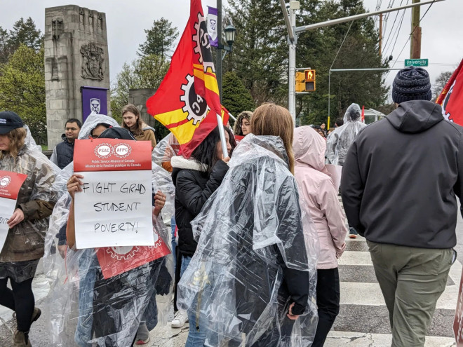 Graduate teaching assistants picketing outside Western University to fight unfair wages. 
