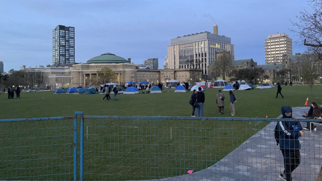 Pro-Palestinian demonstrators set up tents on the grounds of the University of Toronto.