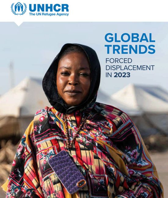 Cover of the Global Trends 2023 report featuring a woman in an IDP camp.