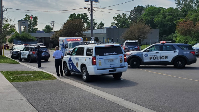 A large police presence is shown outside of a North York school on Monday afternoon. 