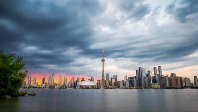Threatening clouds are seen over the skyline of Toronto.