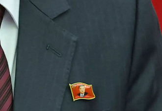 朝鲜人的“必备单品”：胸口的金正恩像章