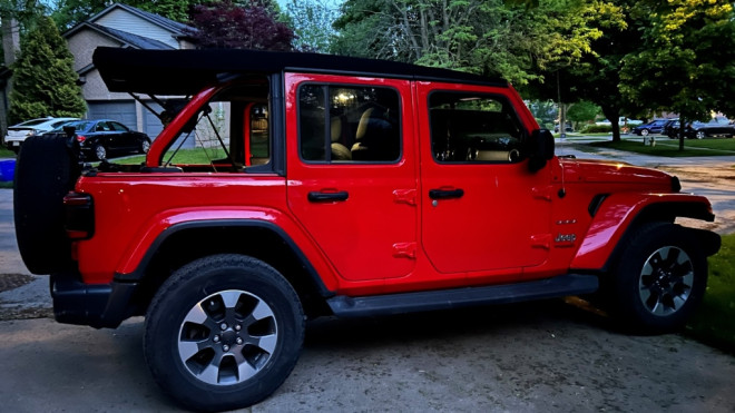 Vanessa Sabatini's red Jeep was stolen from a hotel parking lot in Anjou during the Canada Day long weekend. (Submitted photo)