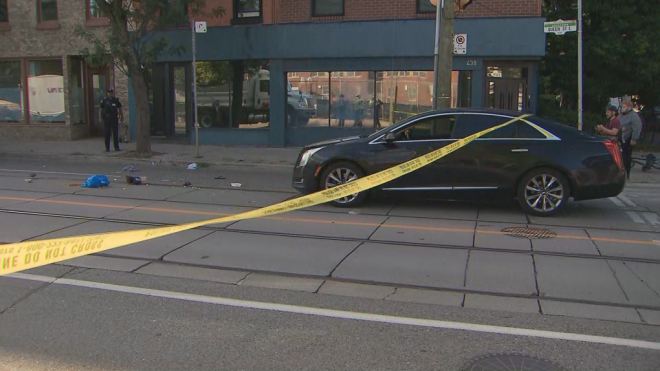 Police are on the scene of a fatal collision in the area of Queen Street East and Sackville Street on Thursday, July 18, 2024. (CP24)