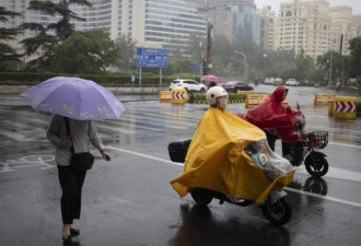 台风侵袭中国湖北 外围云系使东北降下暴雨