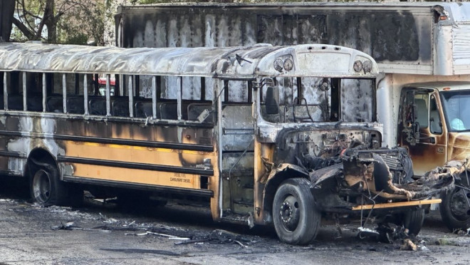 A school bus in a parking lot on Wilson Avenue near Bathurst Street in North York caught fire on July 29, 2024