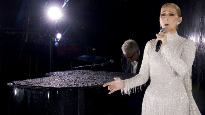 This photo released by the Olympic Broadcasting Services shows Canadian Singer Celine Dion performing on the Eiffel Tower during the opening ceremony for the 2024 Summer Olympics in Paris, France, Friday, July 26, 2024. (Olympic Broadcasting Services)