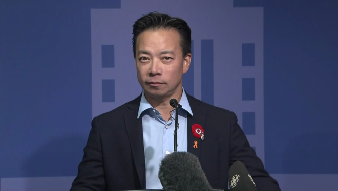 FILE - Vancouver Mayor Ken Sim addresses the media from City Hall in 2022.