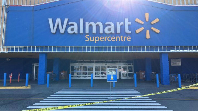 Caution tape, a sign that says 'sorry, we're closed' in front of at a Walmart in Halifax on Oct. 21, 2024.