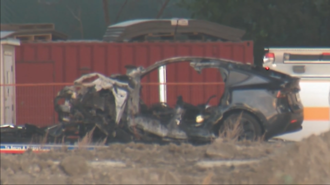 A Tesla gutted by fire after crashing into a guard rail on Lake Shore Boulevard in Toronto on Thursday, Oct. 24, 2024. (CTV Toronto)