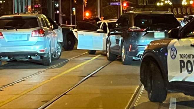 Toronto police investigate a shooting in the area of Queen Street West and Sudbury Street near Dufferin Street on Nov. 11, 2024