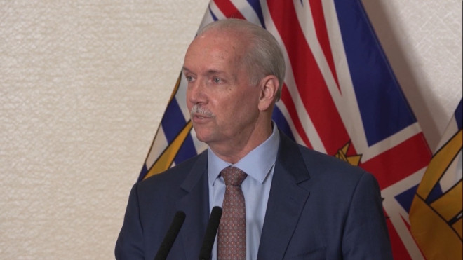 Former B.C. premier John Horgan speaks to media.