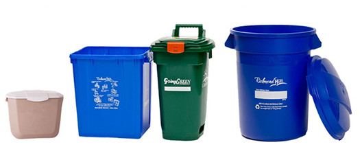 Image of blue boxes, green bin, kitchen container and garbage tags