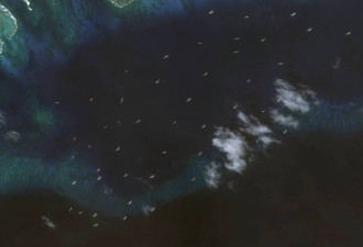 中国海上民兵船大量集结南海中业岛 卫星照曝光