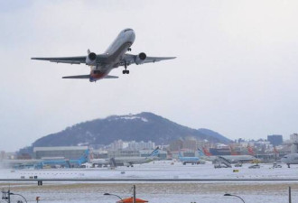 中国游客无人机空拍国际机场被逮