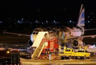 釜山航空机尾失火7伤 传机内置物柜行动电源酿祸