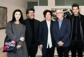 范冰冰被德国总理接见，穿灰大衣打扮朴素难掩秀外慧中