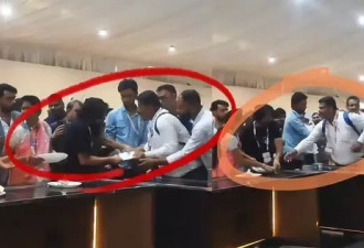 印度投资大会秒变“抢食乱战”，争夺餐盘似拔河