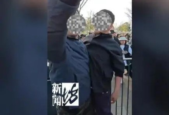 两男子在上海迪士尼大打出手，因为抽烟