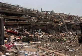 缅甸强震 住数百华人11层公寓倒塌 41°C下弥漫尸臭